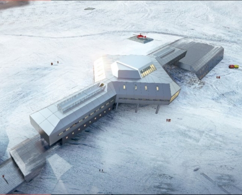 flybilde av bygning i snø